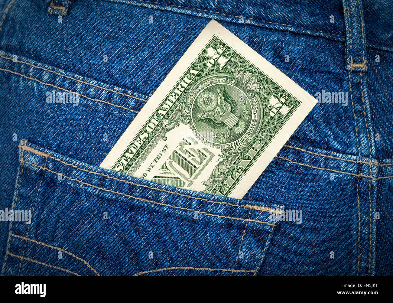 La banconota di un dollaro americano nel retro tasca dei jeans Foto Stock