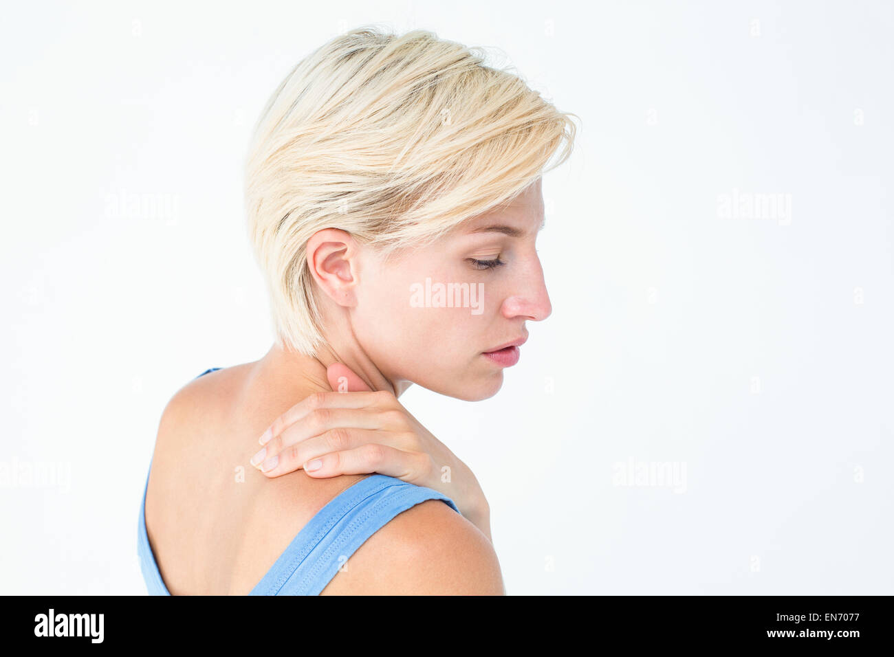 Donna informale con dolore al collo Foto Stock