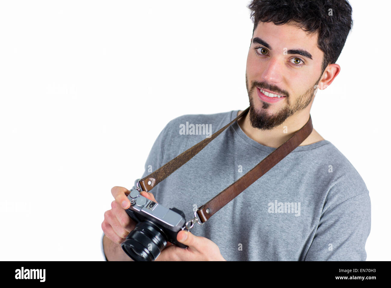 Uomo informale tenendo la sua fotocamera Foto Stock