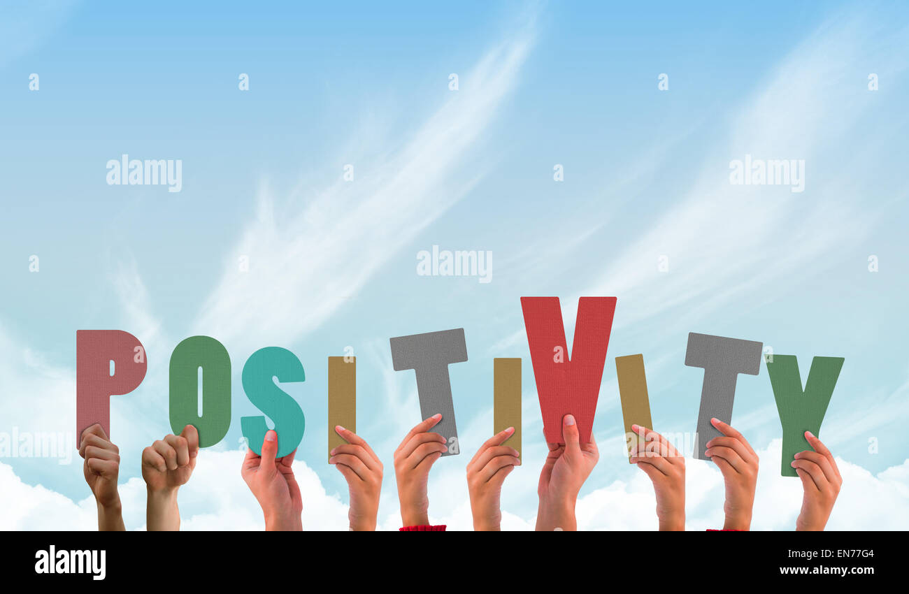Immagine composita delle mani che mostra positività Foto Stock