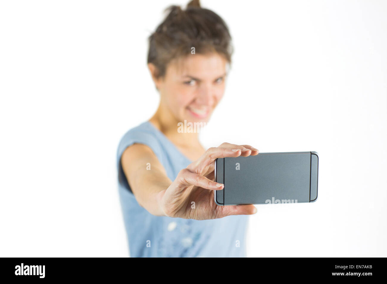 Casual brunette prendendo un selfie Foto Stock