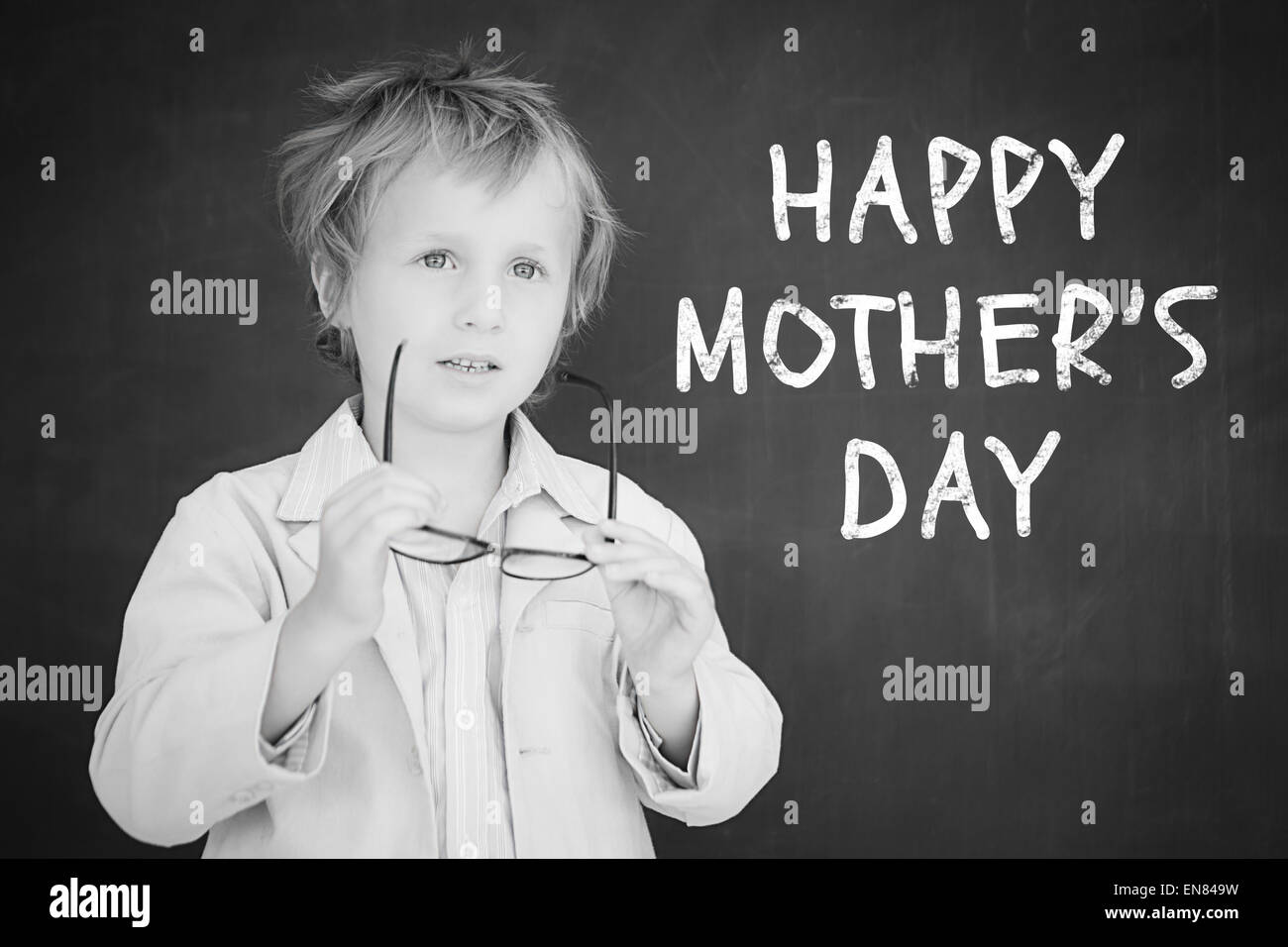 Immagine composita di schoolchild con Blackboard Foto Stock