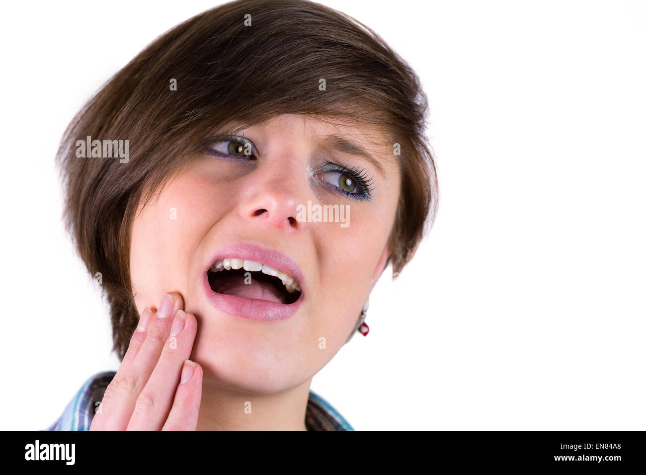 Bella bruna con un mal di denti Foto Stock