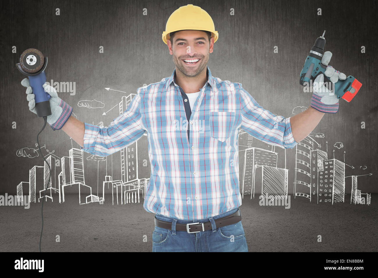 Immagine composita del lavoratore manuale holding power tools Foto Stock