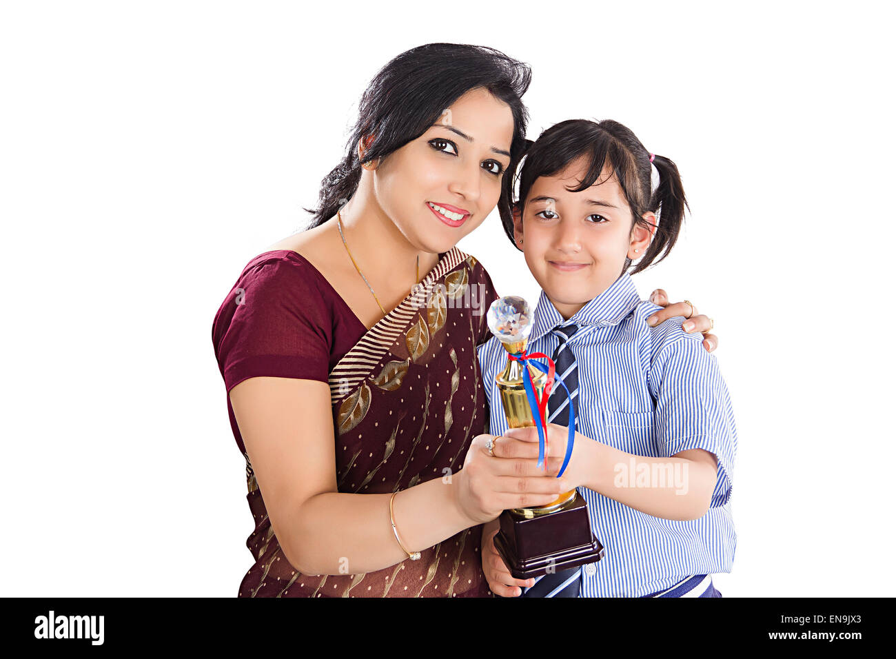 Indian madre e bambini il trofeo della vittoria Foto Stock