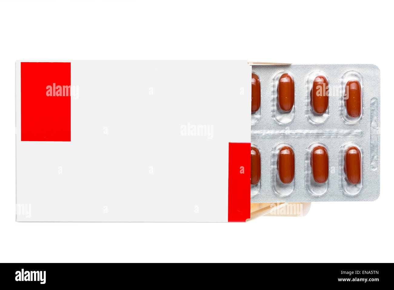 Scatola bianca con le pillole di marrone in una confezione blister su un sfondo isolato Foto Stock