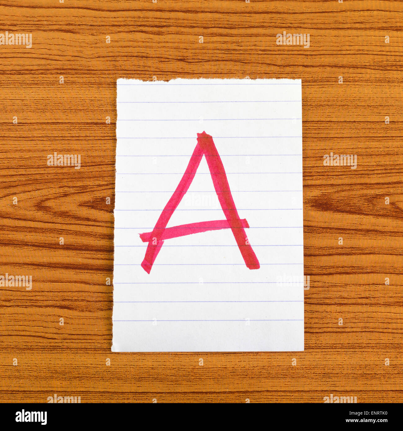 Grado a sulla parete di legno sfondo Foto Stock