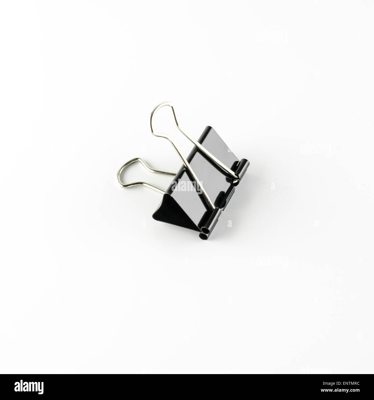 Clip legante su sfondo bianco Foto Stock