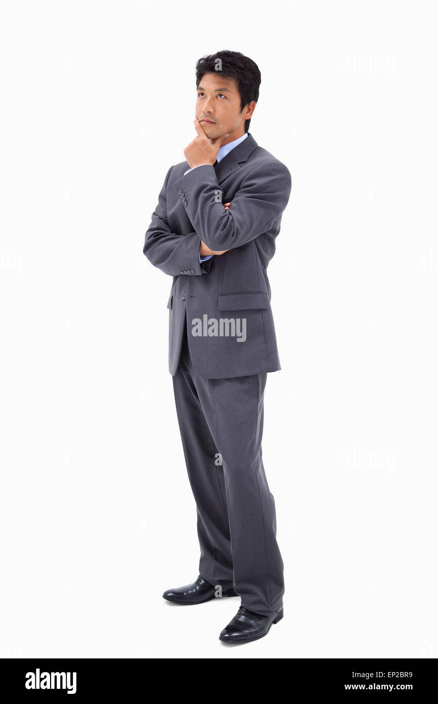 Ritratto di un oculato imprenditore con le braccia incrociate Foto Stock