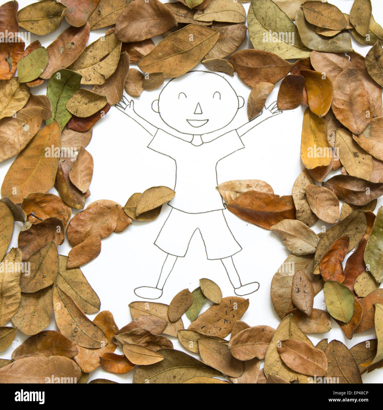 Disegno di un ragazzo circondato da foglie Foto Stock
