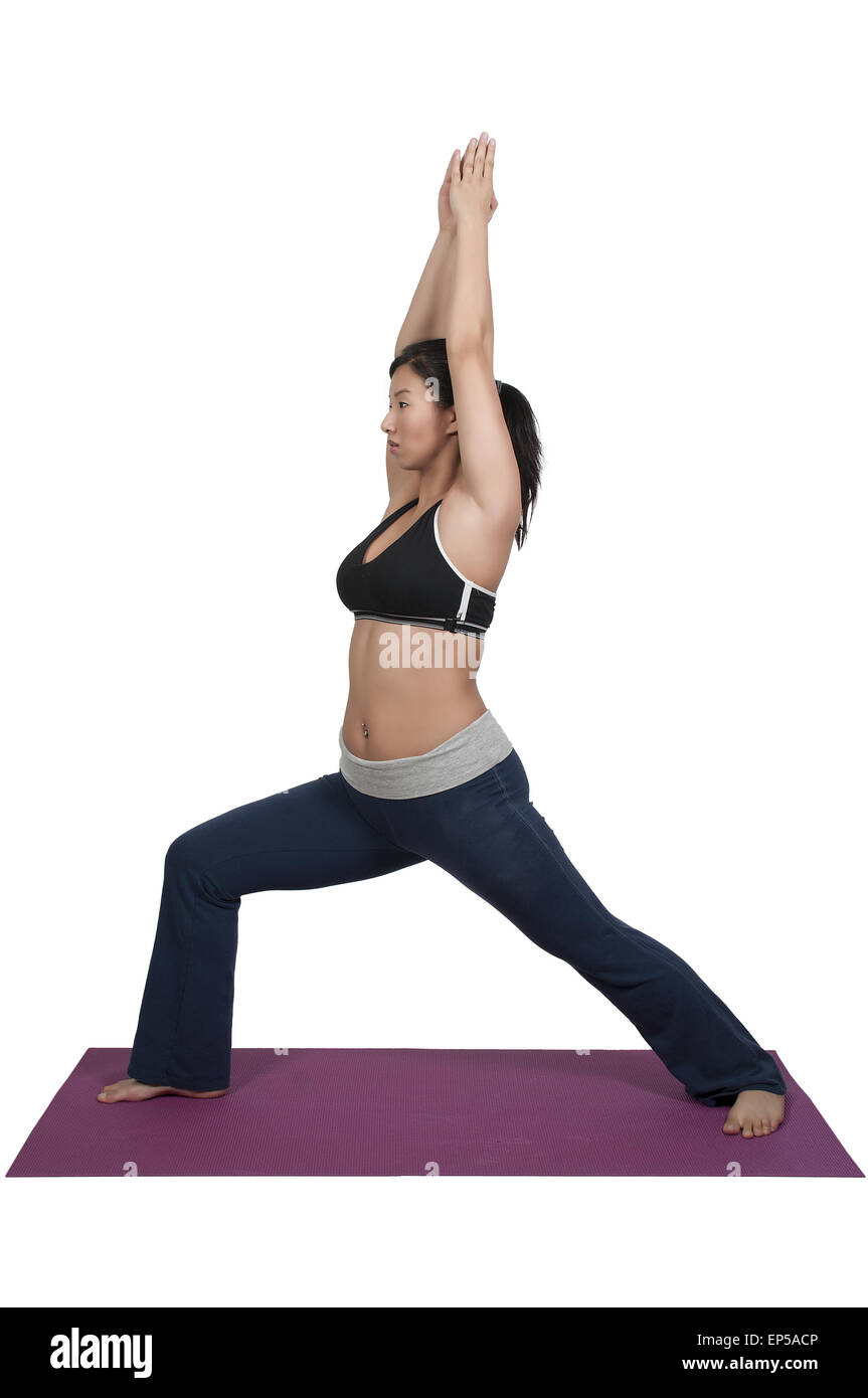 Donna asiatica fare yoga Foto Stock