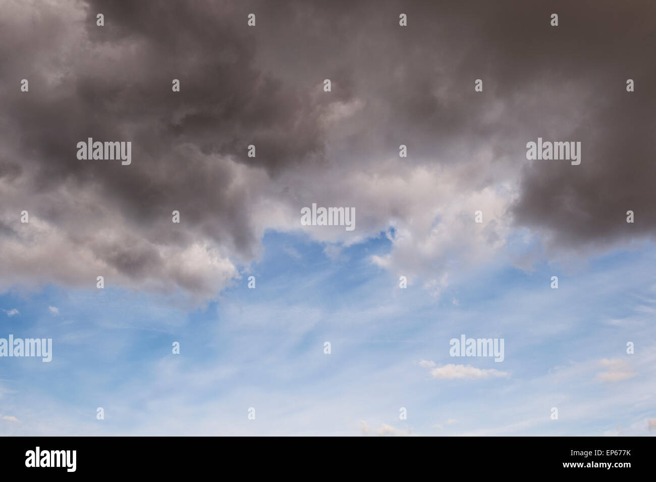 Pioggia nuvole e cielo blu. Scozia Foto Stock