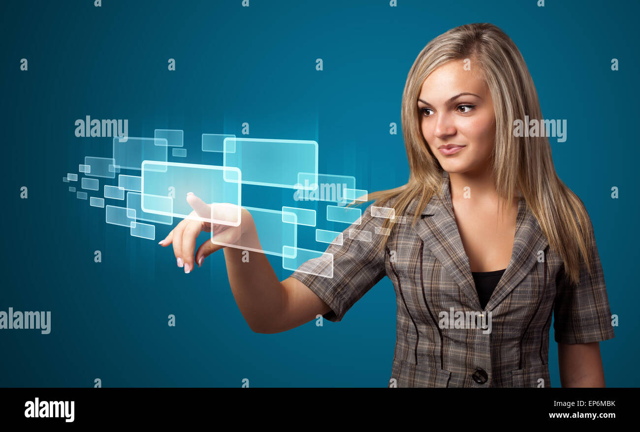 Imprenditrice premendo high tech tipo di pulsanti moderno Foto Stock