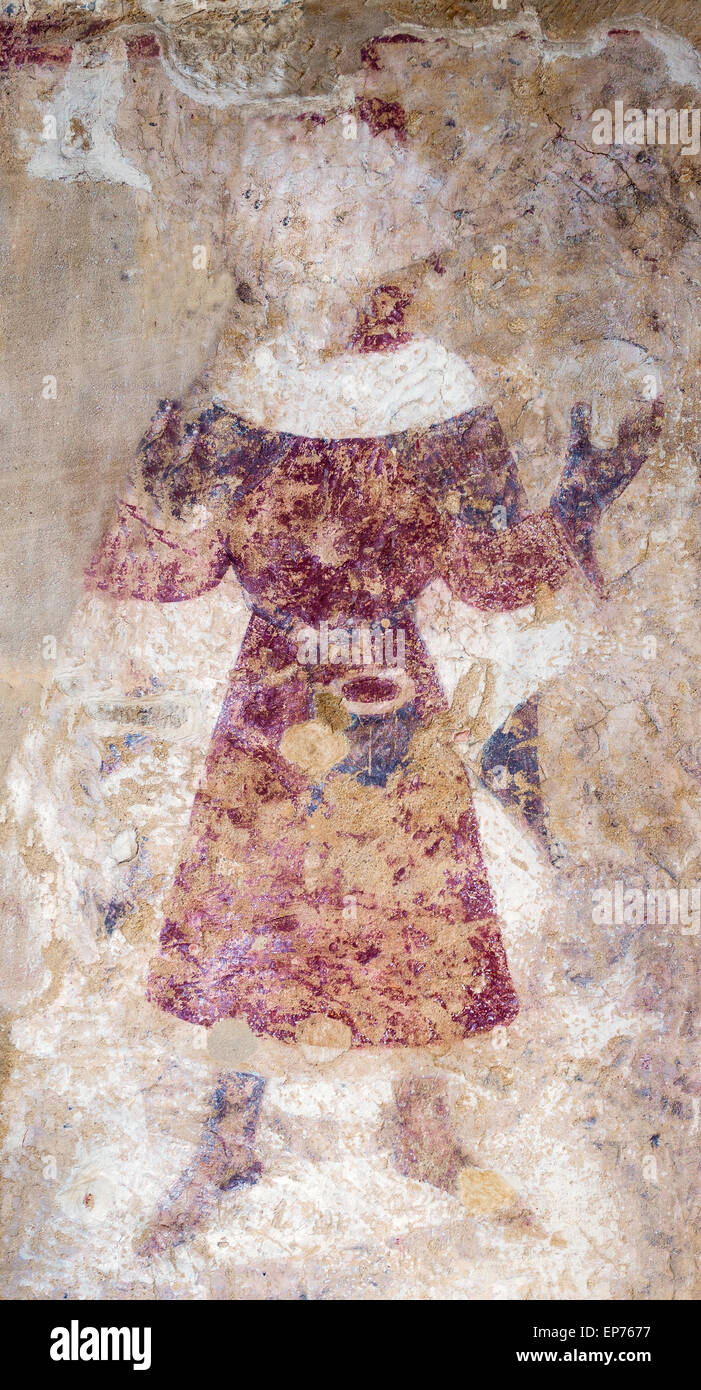 Una pittura murale medioevale a Sant'Andrea Chiesa (Lyddington, Rutland, Inghilterra) mostra un re tenendo un orb e indossando un ermellino Foto Stock