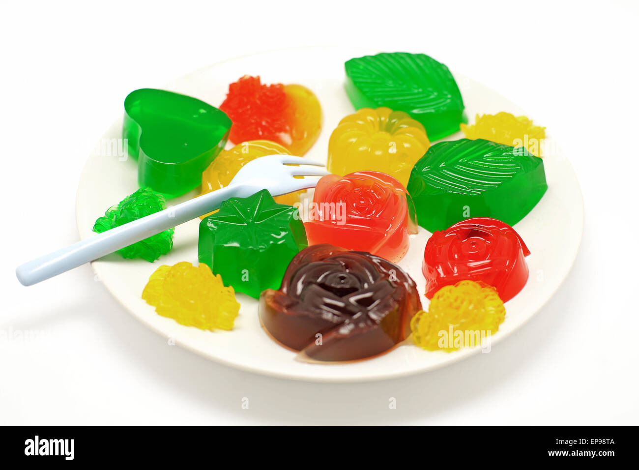 Gelatina colorata o jelly dessert isolati su sfondo bianco Foto Stock