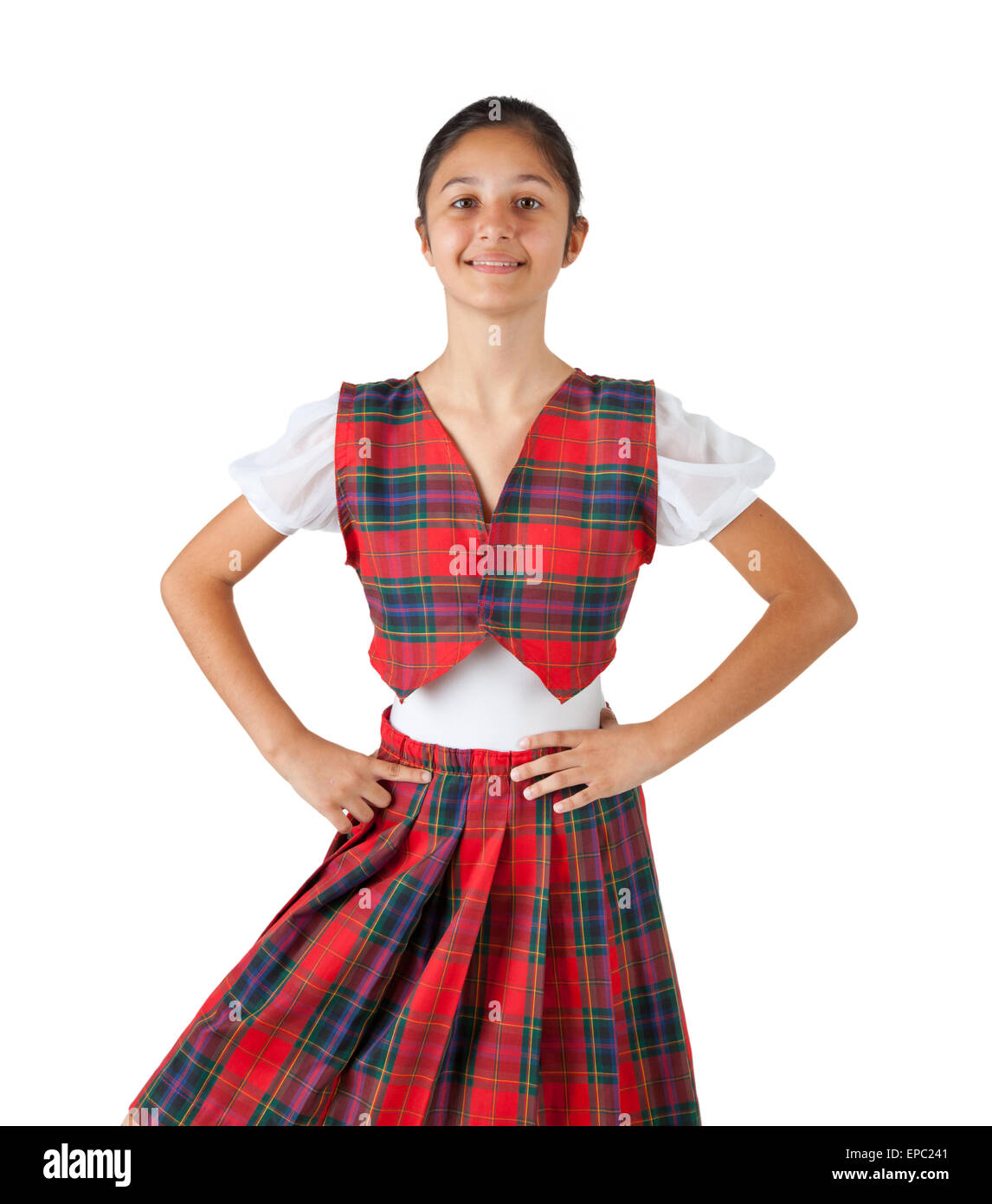 Adolescente vestito con abiti tipici plaid rosso su sfondo bianco. Foto Stock