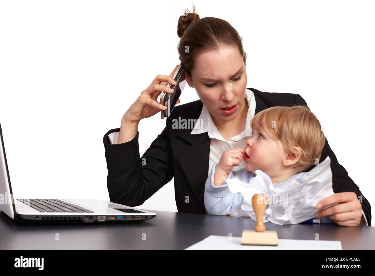 La madre e il bambino al lavoro Foto Stock