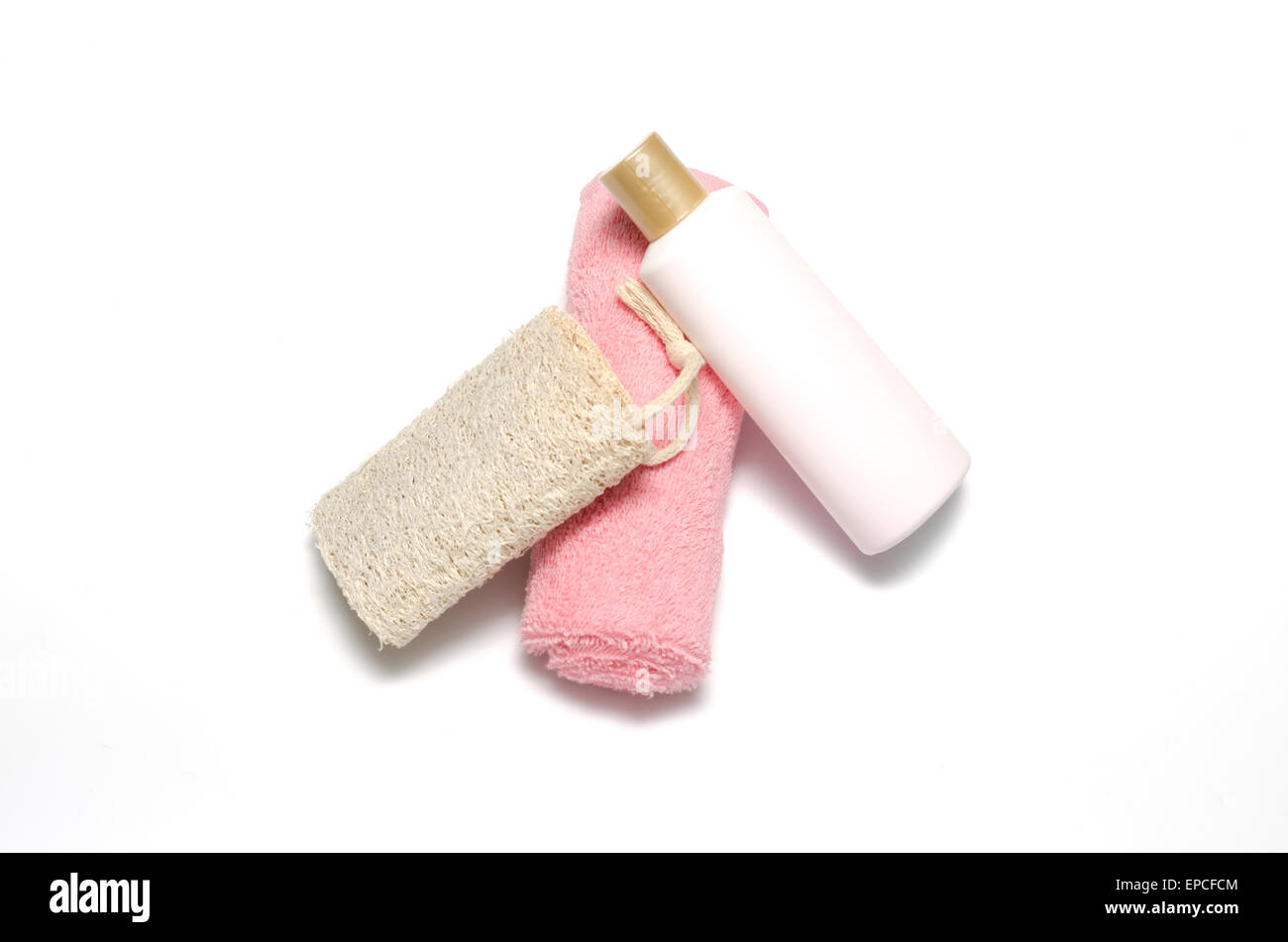 Sapone liquido e loofah asciugamano rosa isolato su uno sfondo bianco Foto Stock