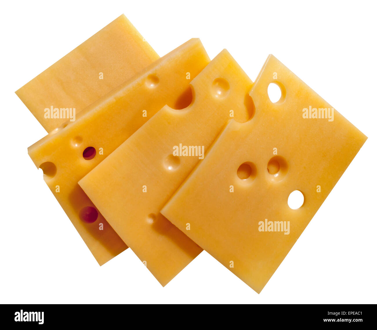Pezzi di formaggio a fette con fori. Foto Stock