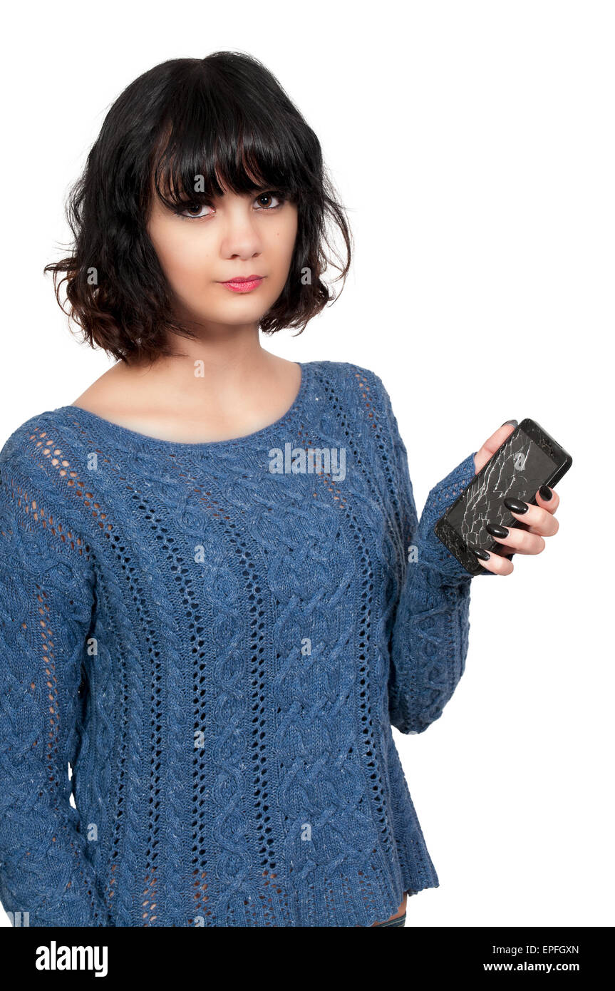 Donna con incrinato lo schermo del telefono Foto Stock