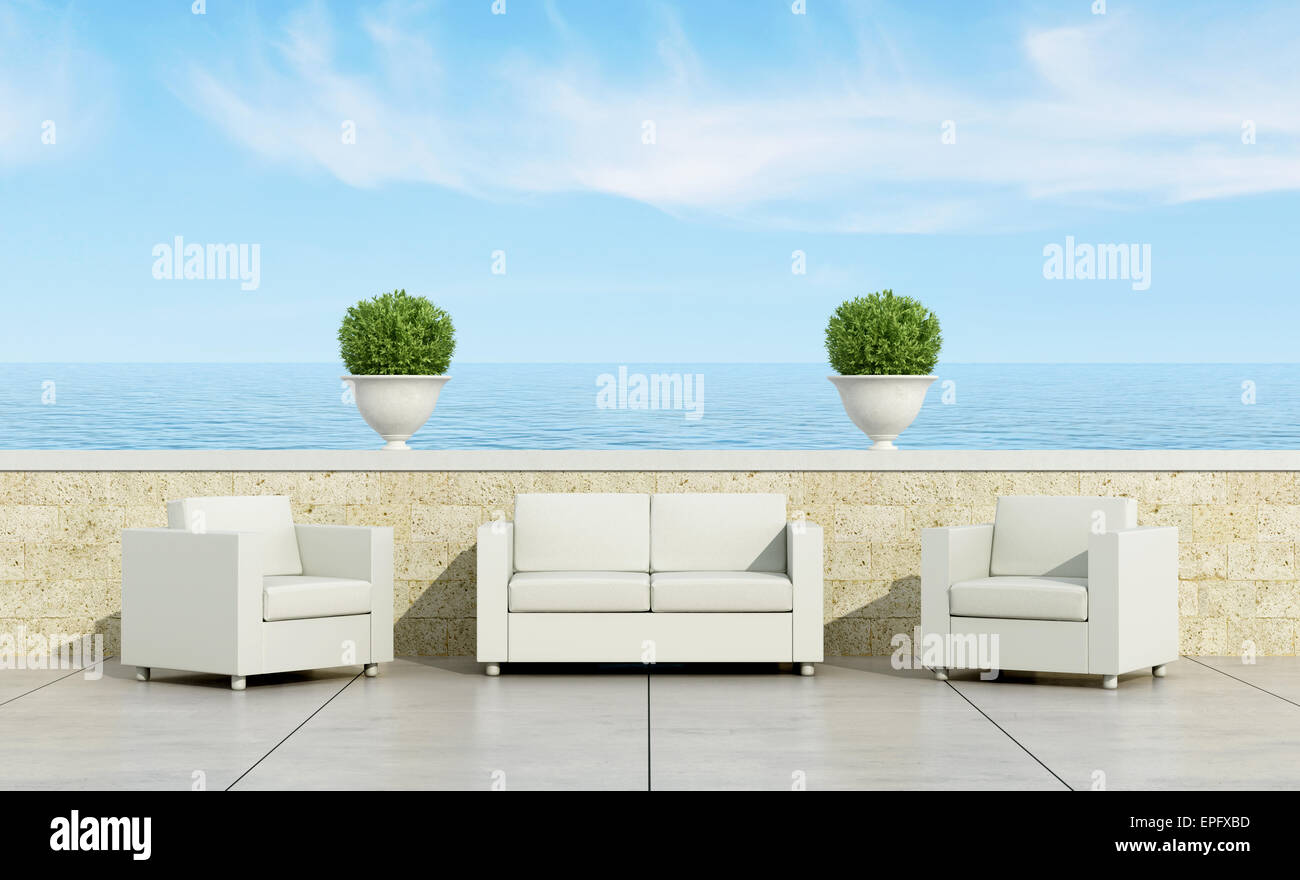 Terrazza con divano bianco e poltrone che si affaccia sul mare - il rendering 3D Foto Stock