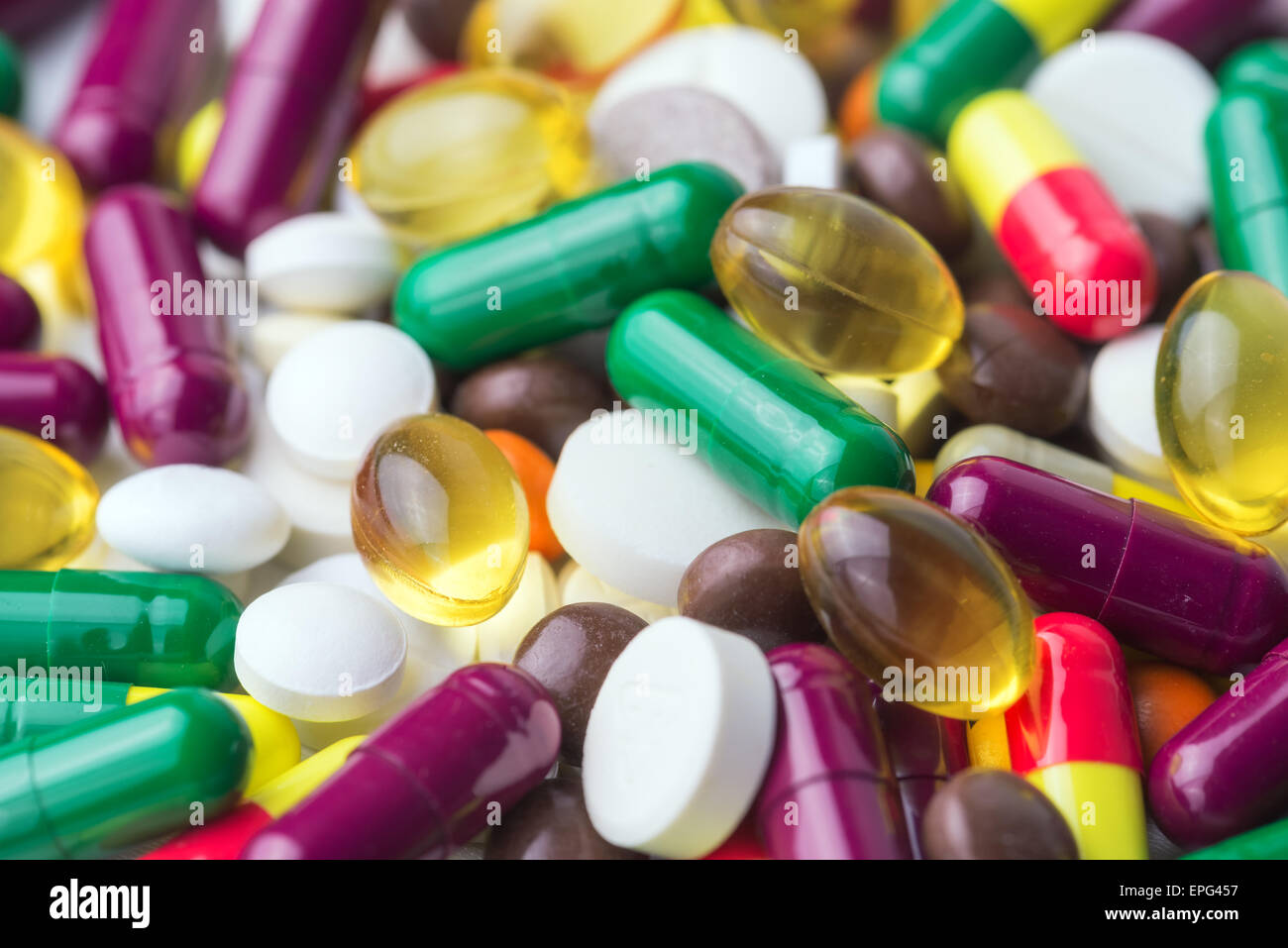Molte pillole di colore da vicino Foto Stock