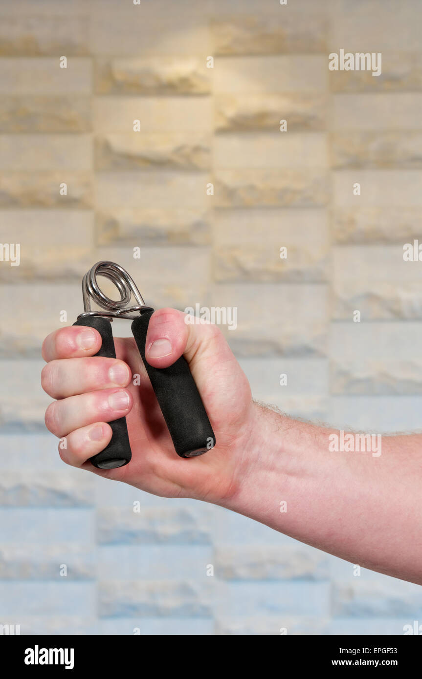 Uomo con impugnatura atleta Foto Stock