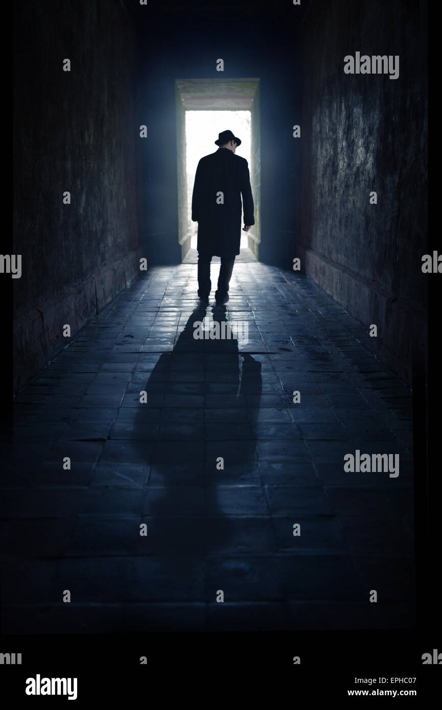 Misterioso uomo in silhouette Foto Stock