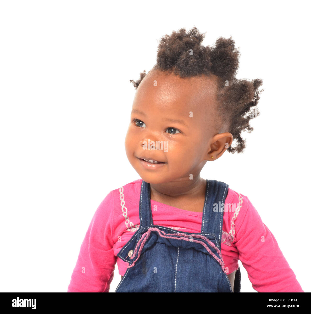 Giovane africana bambina divertendosi in photo studio Foto Stock