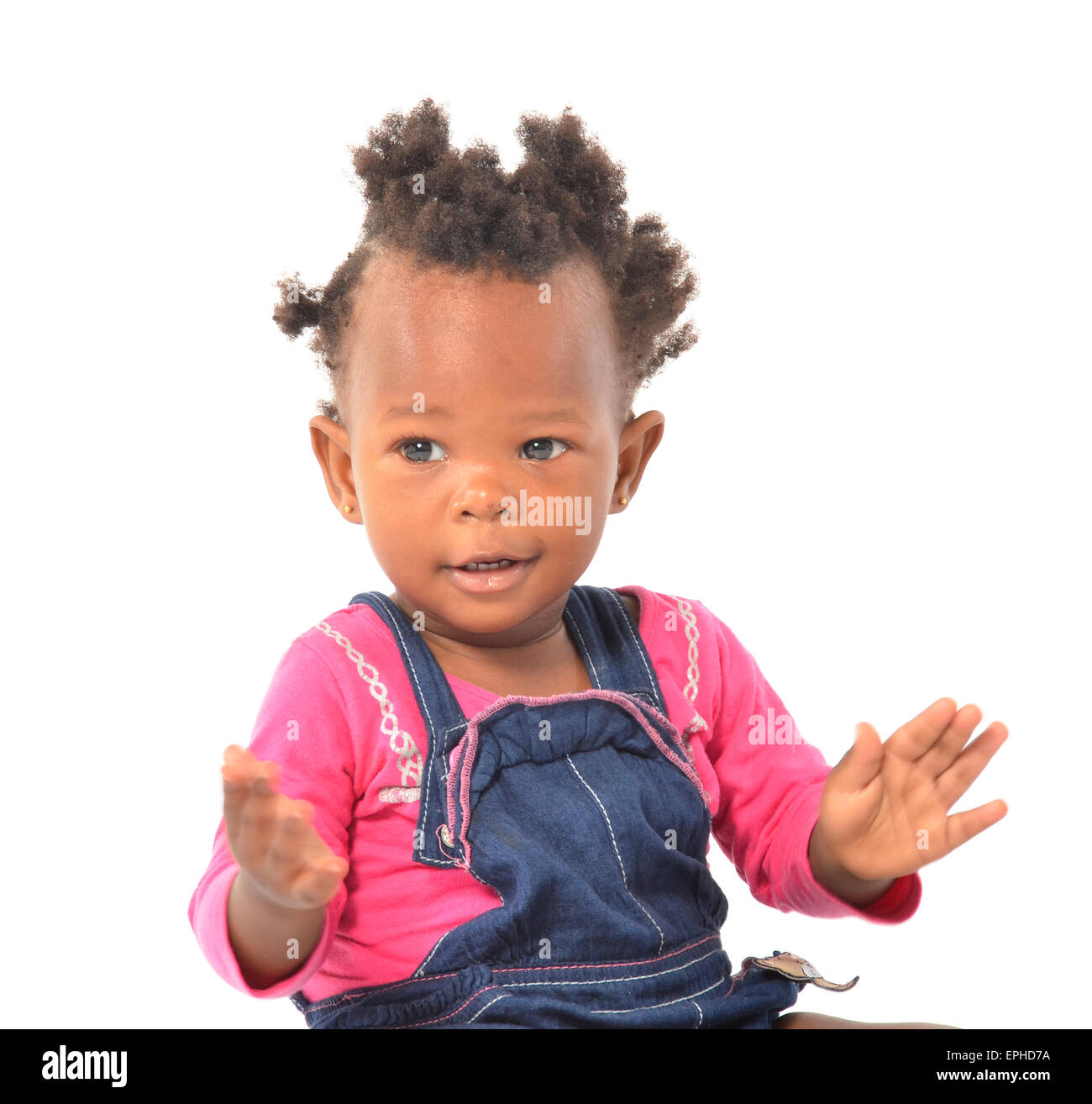 Giovane africana bambina divertendosi in photo studio Foto Stock