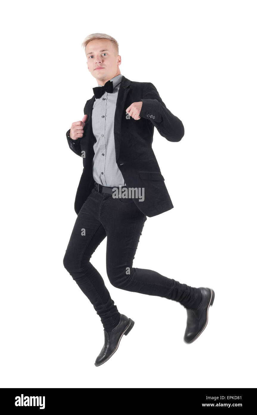 Bel Uomo in camicia e bow tie-jumping Foto Stock