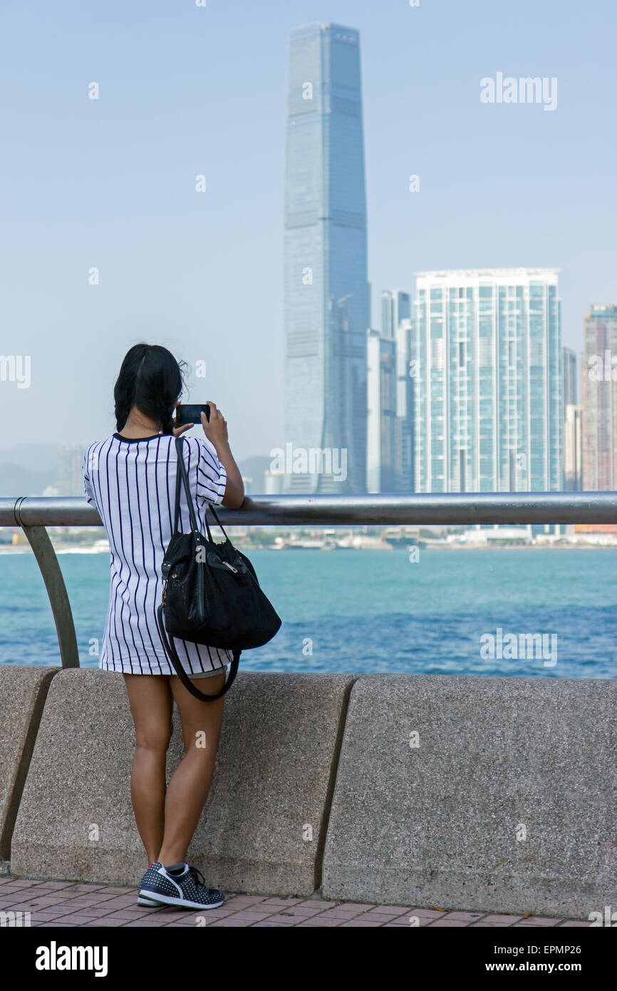 Donna sulla costa fotografie di Hong Kong Foto Stock