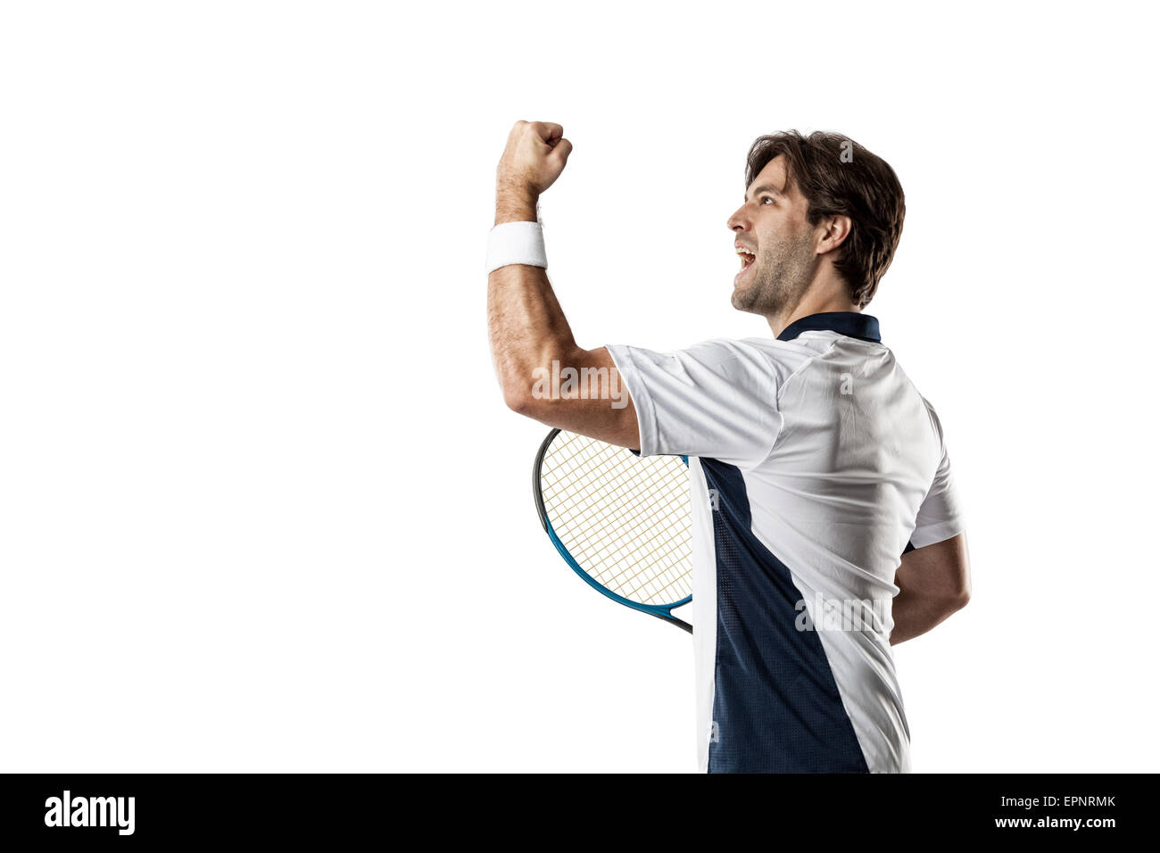 Giocatore di Tennis celebrando, su uno sfondo bianco. Foto Stock