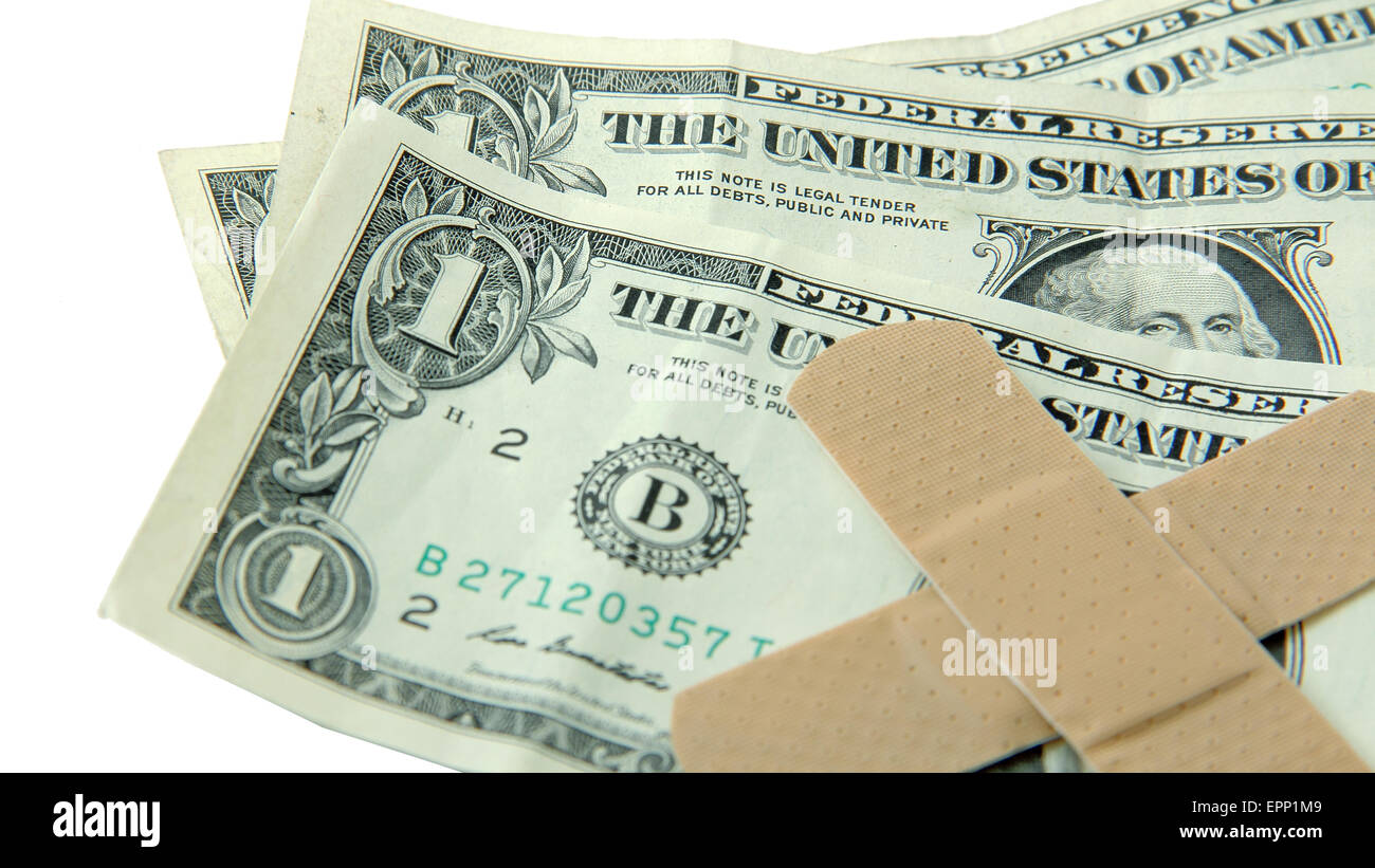 Le fatture del dollaro con band-aids = disagi economici Foto Stock