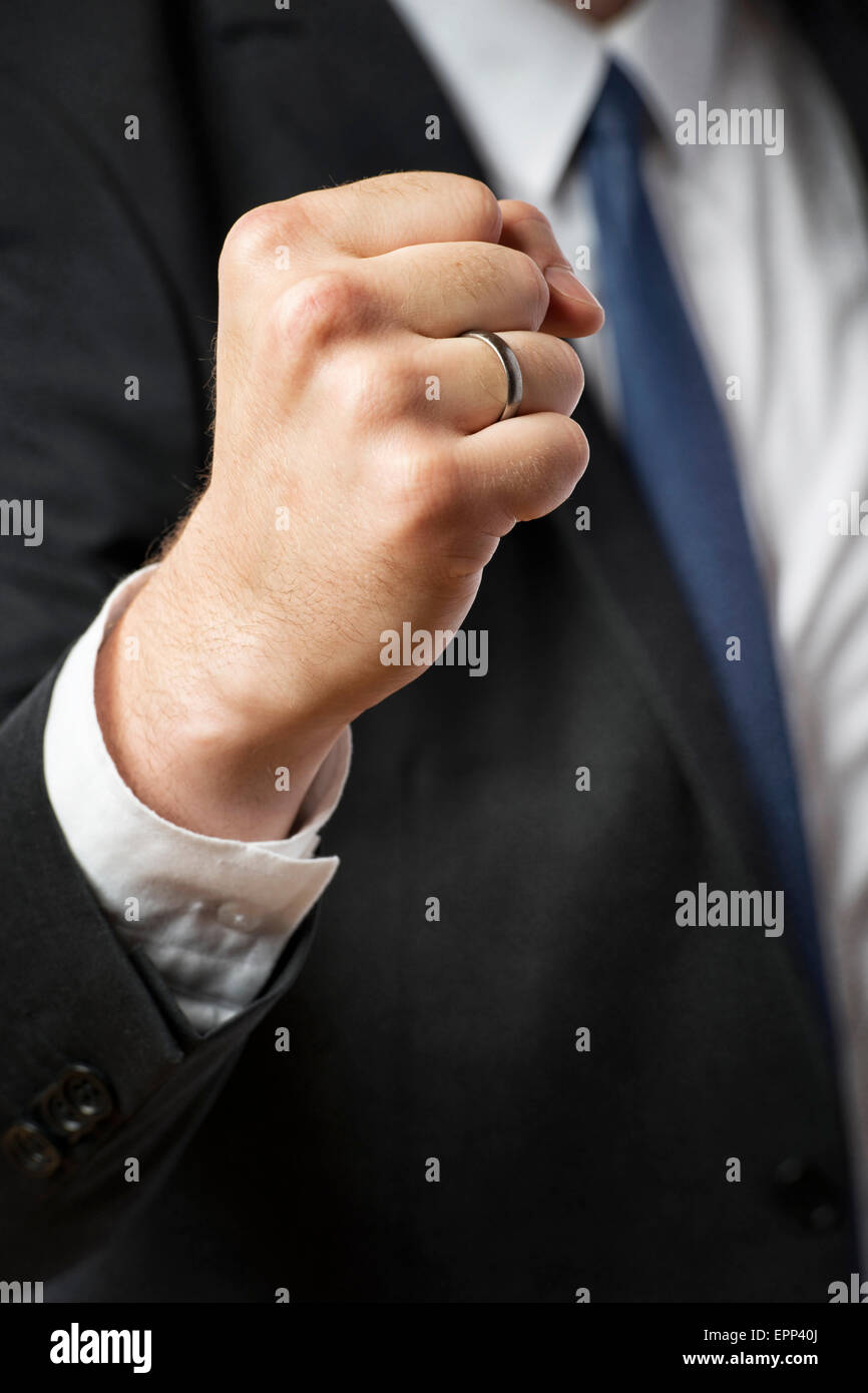 Primo piano immagine del pugno di un imprenditore Foto Stock