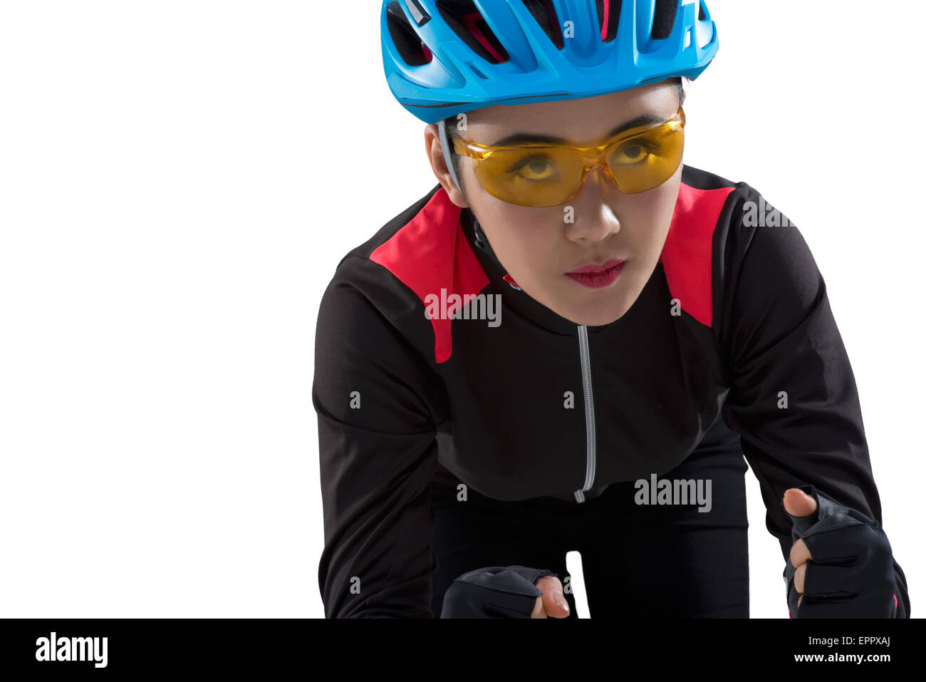 Vista laterale di un ciclista femmina di una bicicletta Foto Stock