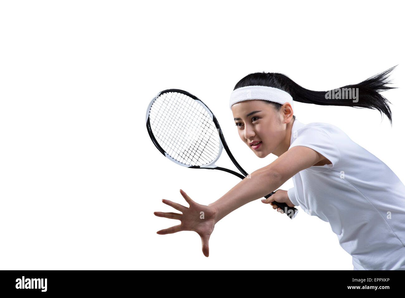 Femmina di giocatore di tennis pronto a colpire la sfera, ritratto Foto Stock