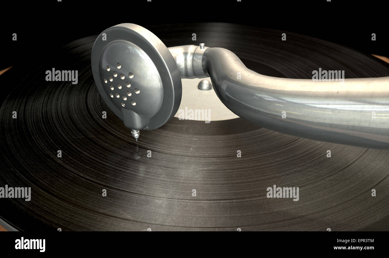 Un primo piano og l'ago di un vecchio ottone e legno grammofono toccando un vinile isolato su un sfondo scuro Foto Stock