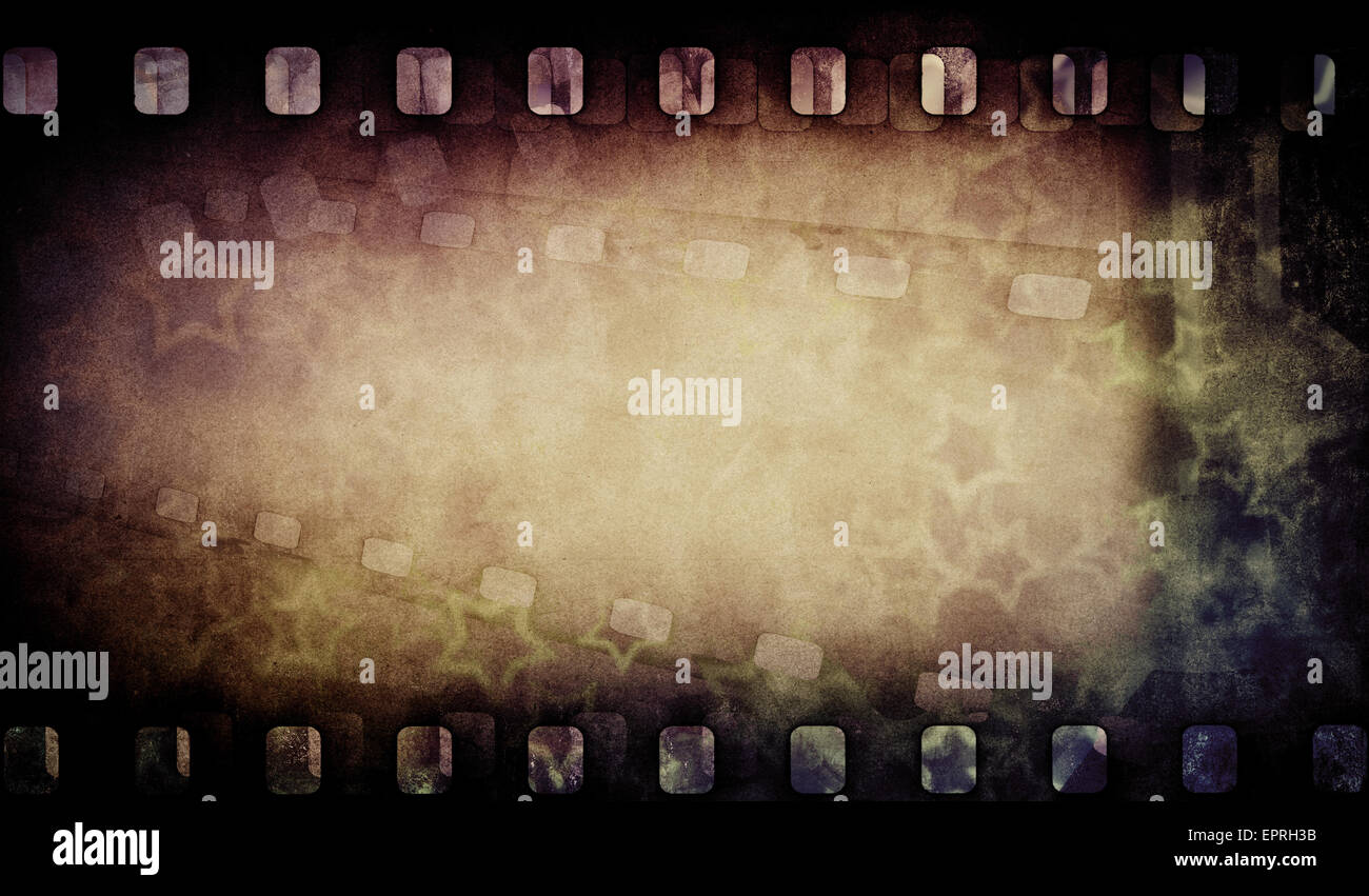 Grunge vecchio motion picture aspo con striscia di pellicola. Sfondo vintage. Foto Stock