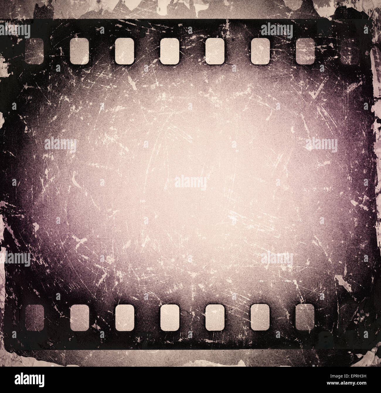 Grunge vecchio motion picture aspo con striscia di pellicola. Sfondo vintage. Foto Stock