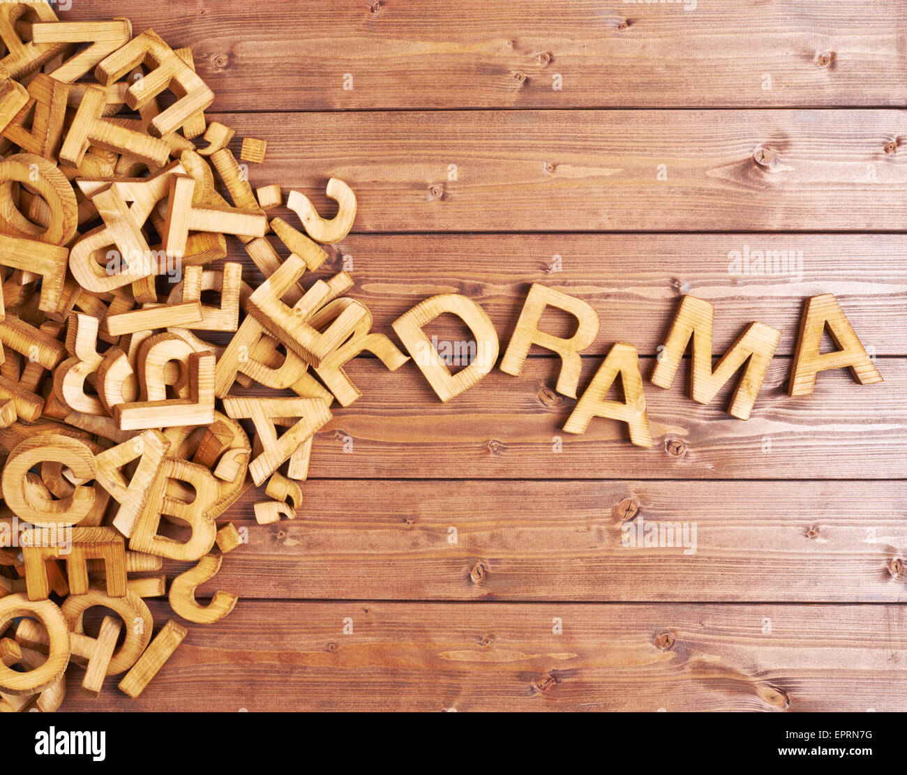 Il dramma di parola fatta con lettere in legno Foto Stock