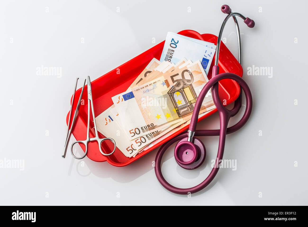 Medico e di denaro. Foto Stock