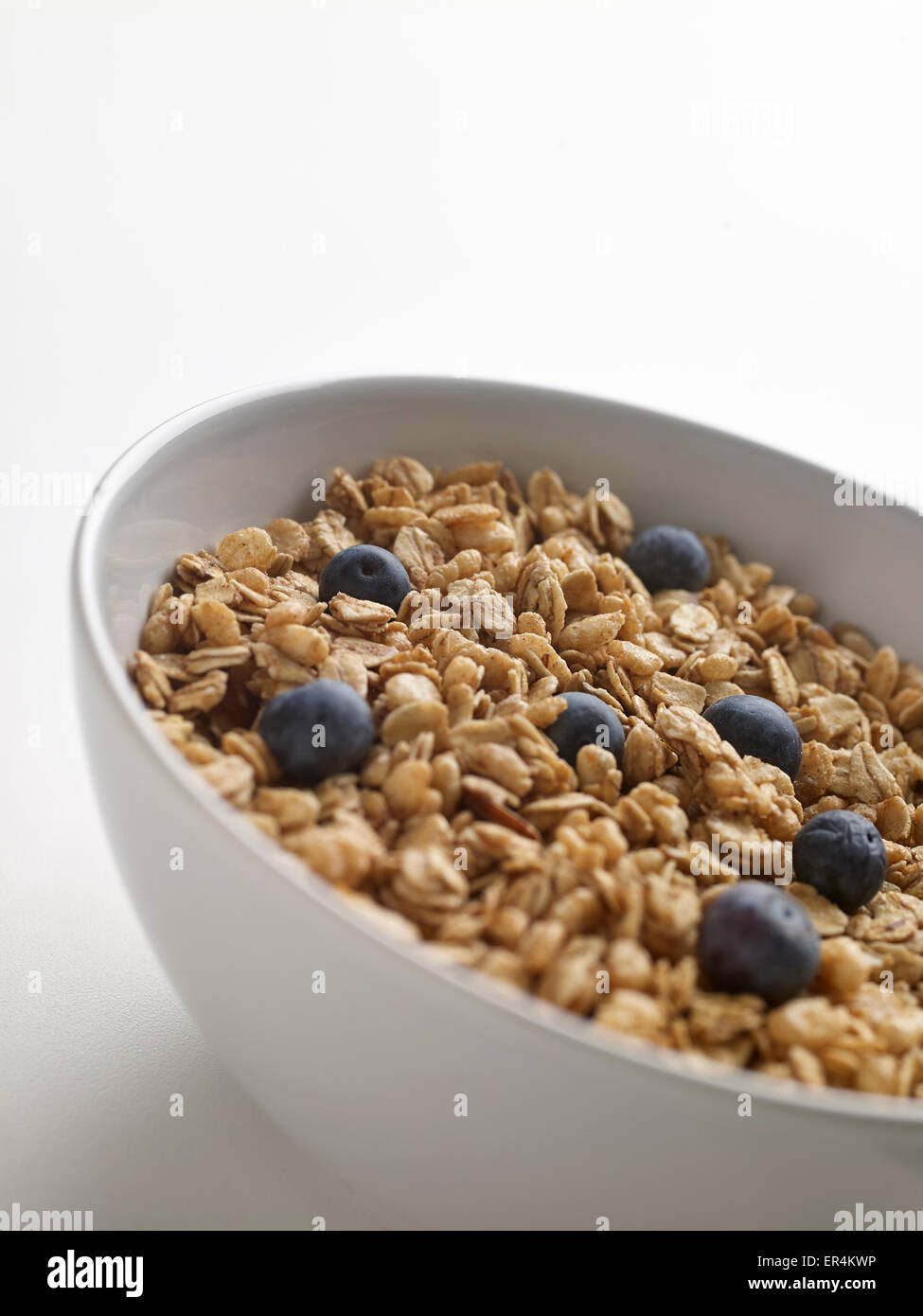 Ciotola di cereali granola con mirtilli Foto Stock