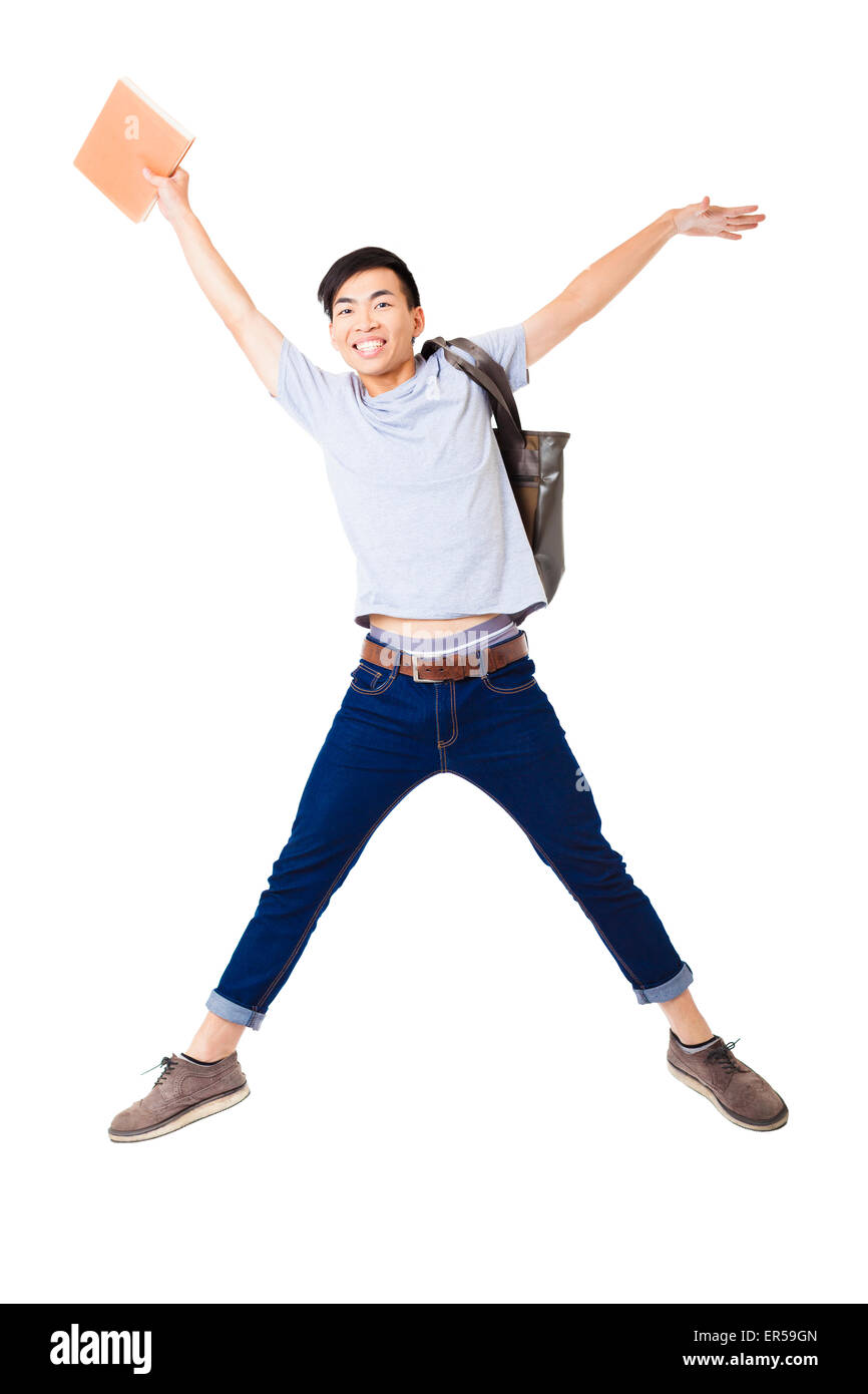 Giovane uomo felice studente jumping Foto Stock