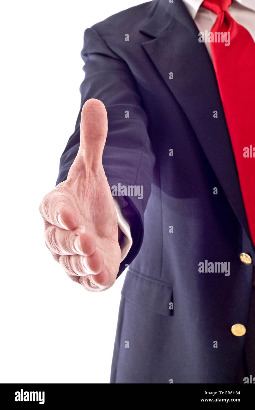 Uomo d'affari offrendo la messa a fuoco di handshake su Palm e il pollice della mano Foto Stock