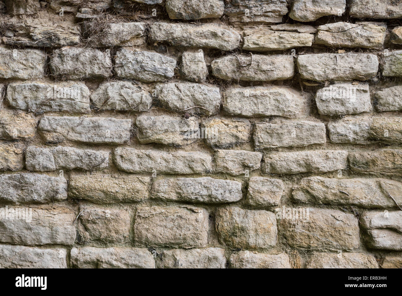 Sfondi - Un antico muro di pietra Foto Stock