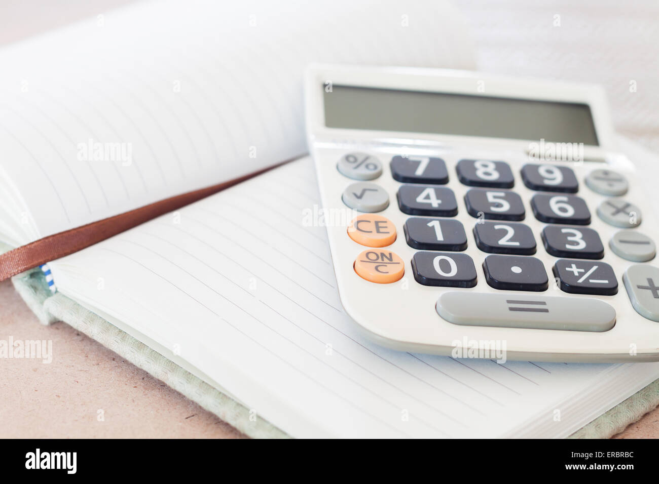 Calcolatrice sul notebook vuoto, stock photo Foto Stock