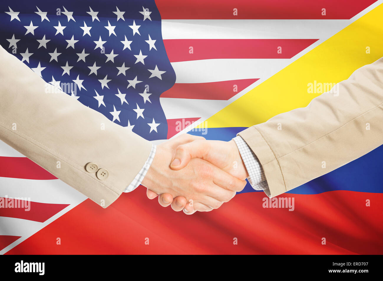 Imprenditori stringono le mani - negli Stati Uniti e in Colombia Foto Stock