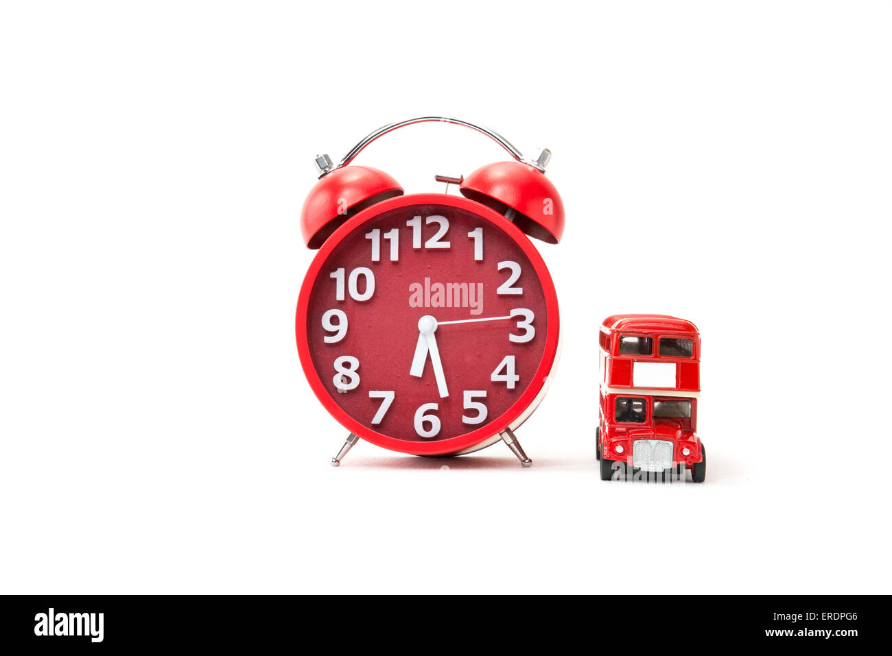 Un retrò orologio sveglia con un bus rosso Foto Stock