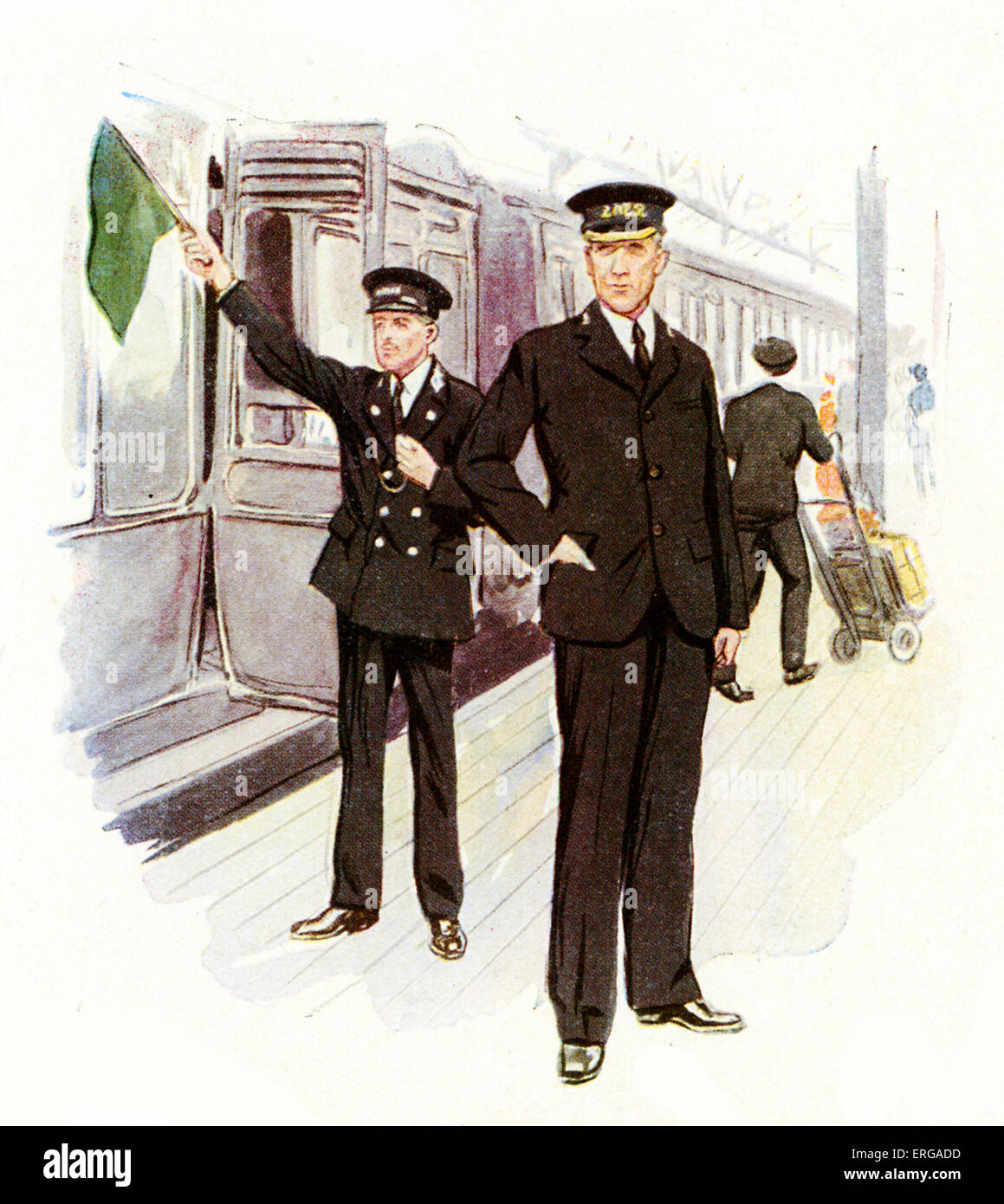 Il personale ferroviario di uniformi, 1920-30s: Inglese conduttore del treno e la stazione ferroviaria principale. Foto Stock